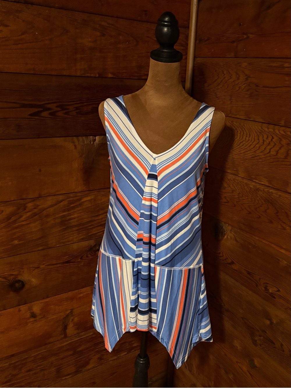 SKYE’S THE LIMIT. LADIES ASYMMETRICAL TOP
